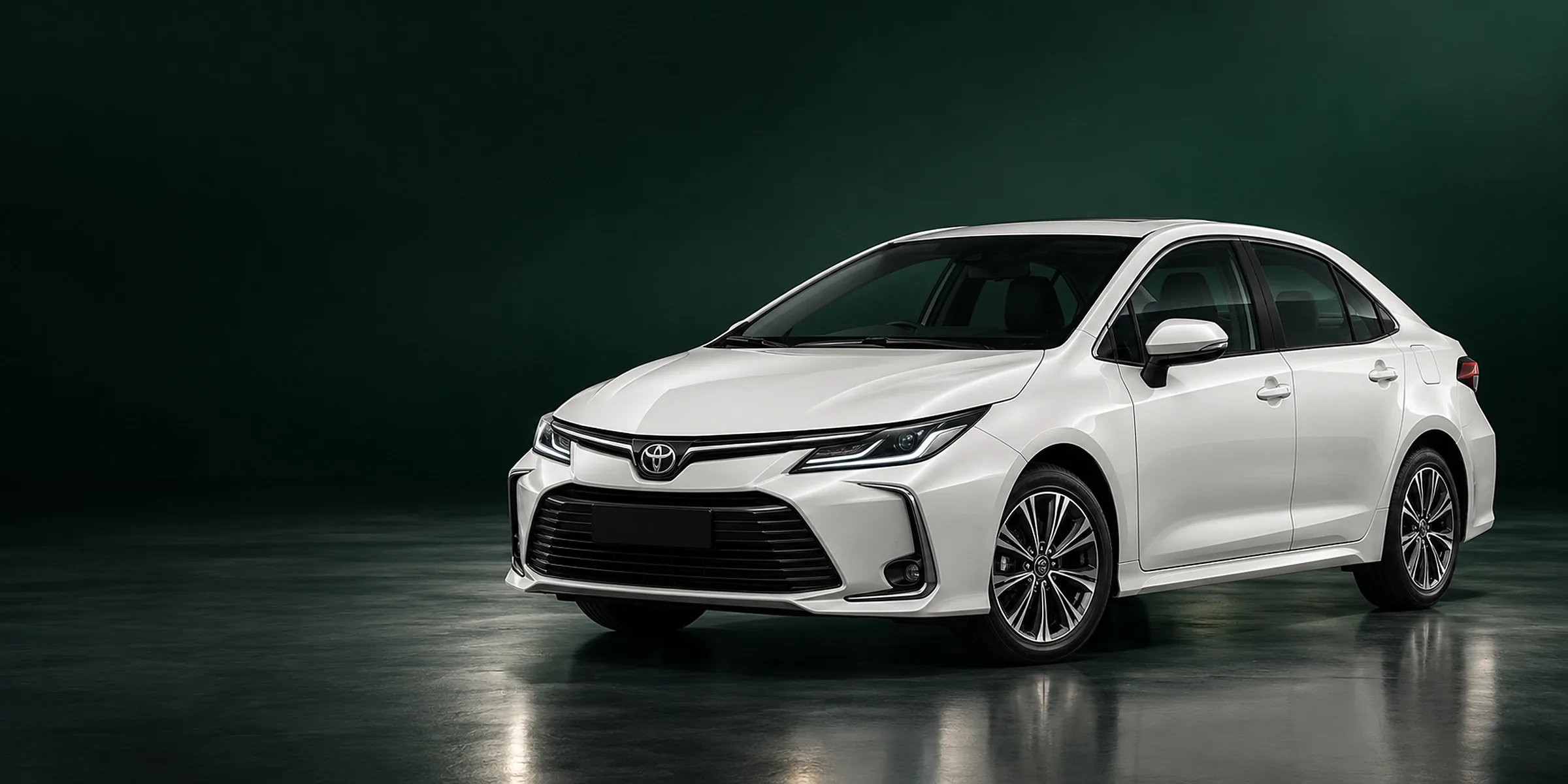Toyota Corolla blanco perlado en estudio